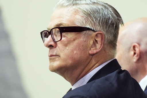 FILE - Actor Alec Baldwin attends his trial on involuntary manslaughter for the 2021 fatal shooting of cinematographer Halyna Hutchins during filming of the Western movie "Rust," July 12, 2024, at Santa Fe County District Court in Santa Fe, N.M. (Ramsay de Give/Pool Photo via AP, File)