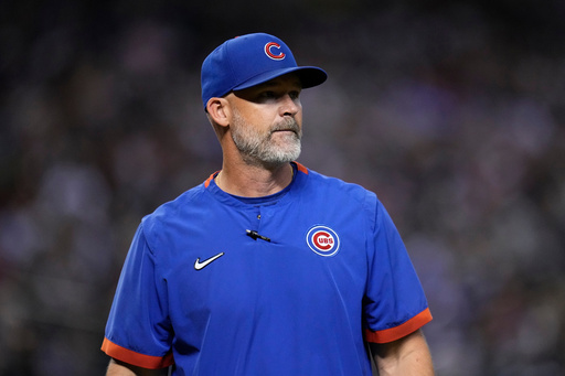 FILE - Chicago Cubs manager David Ross walks back to the dugout during the 10th inning of a baseball game against the Arizona Diamondbacks, Sept. 16, 2023, in Phoenix. (AP Photo/Ross D. Franklin, File)