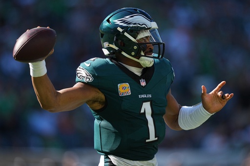 Philadelphia Eagles quarterback Jalen Hurts looks to pass during the second half of an NFL football game against the Denver Broncos on Sunday, Oct. 5, 2025, in Philadelphia. (AP Photo/Matt Rourke)