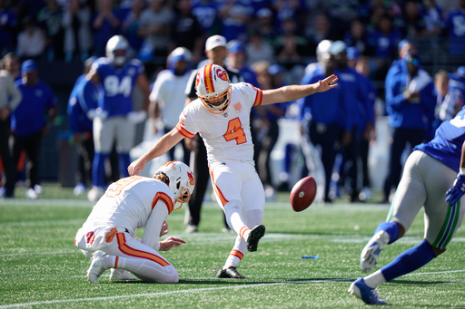 Tampa Bay Buccaneers place-kicker Chase McLaughlin (4) kicks a field goal during the first half of an NFL football game against the Seattle Seahawks, Sunday, Oct. 5, 2025, in Seattle. (AP Photo/Stephen Brashear)