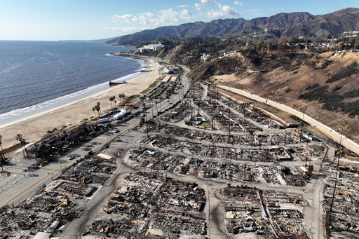 FILE - An aerial view shows the devastation left by the Palisades Fire in the Pacific Palisades section of Los Angeles, Jan. 27, 2025. (AP Photo/Jae C. Hong, file)
