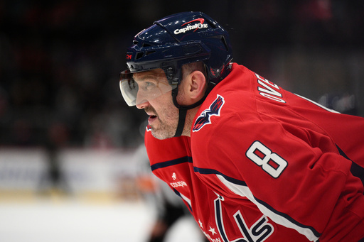FILE - Washington Capitals left wing Alex Ovechkin (8) looks on during a break in the first period of an NHL preseason hockey game against the Boston Bruins, Thursday, October. 2, 2025, in Washington. (AP Photo/Nick Wass, File)