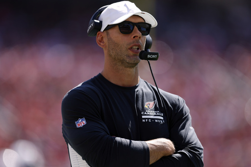 Arizona Cardinals head coach Jonathan Gannon stands on the sideline during the first half of an NFL football game against the San Francisco 49ers, Sunday, Sept. 21, 2025, in Santa Clara, Calif. (AP Photo/Sergio Estrada)