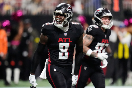 Atlanta Falcons tight end Kyle Pitts (8) celebrates his touchdown against the Washington Commanders during the second half of an NFL football game, Sunday, Sept. 28, 2025, in Atlanta. (AP Photo/Mike Stewart)