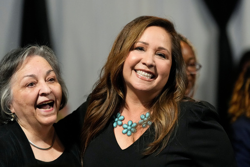 FILE - Arizona Democratic candidate Adelita Grijalva, right, smiles as she celebrates with her mother Ramona Grijalva after being declared the winner against Republican Daniel Butierez to fill the Congressional District 7 seat held by the late Rep. Raúl Grijalva in a special election Sept. 23, 2025, in Tucson, Ariz. (AP Photo/Ross D. Franklin, File)
