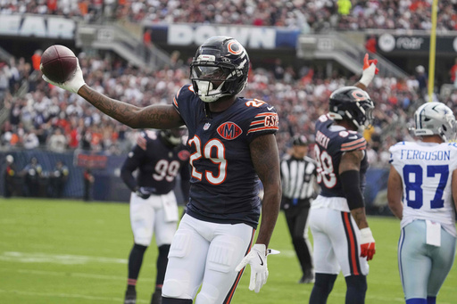 Chicago Bears cornerback Tyrique Stevenson (29) celebrates after stripping the ball away from Dallas Cowboys running back Javonte Williams in the first half of an NFL football game Sunday, Sept. 21, 2025, in Chicago. (AP Photo/Nam Y. Huh)