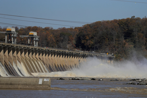 FILE - Water gushes down the Conowingo Dam, Nov. 6, 2019, in Havre De Grace, Md. (AP Photo/Julio Cortez)