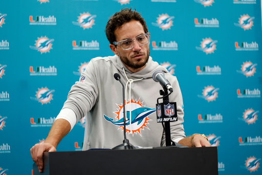 Miami Dolphins head coach Mike McDaniel speaks during a news conference after an NFL football game against the Carolina Panthers, Sunday, Oct. 5, 2025, in Charlotte, N.C. (AP Photo/Rusty Jones)