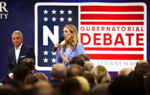 Democrat Mikie Sherrill responds to questions during the first general election gubernatorial debate with Republican opponent Jack Ciattarelli, Sunday, Sept. 21, 2025, in Lawrenceville, N.J. (AP Photo/Noah K. Murray)