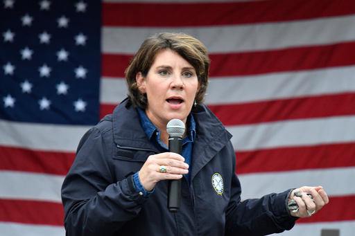 FILE - Democratic candidate for U.S. Senate Amy McGrath speaks to supporters during a rally in Danville, Ky., Oct. 28, 2020. (AP Photo/Timothy D. Easley, File)