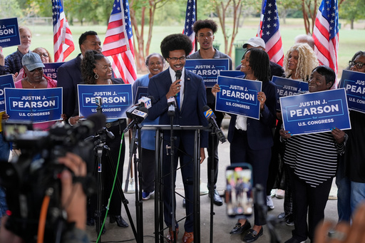 State Rep. Justin J. Pearson, D-Memphis, center, announces his candidacy for U.S. Congress during a news conference Wednesday, Oct. 8, 2025, in Memphis, Tenn. (AP Photo/George Walker IV)