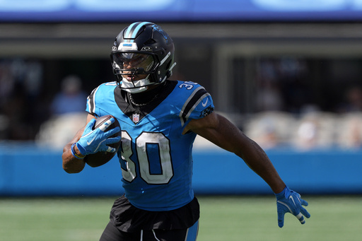 Carolina Panthers running back Chuba Hubbard runs against the Atlanta Falcons during the second half of an NFL football game, Sunday, Sept. 21, 2025, in Charlotte, N.C. (AP Photo/Jacob Kupferman)