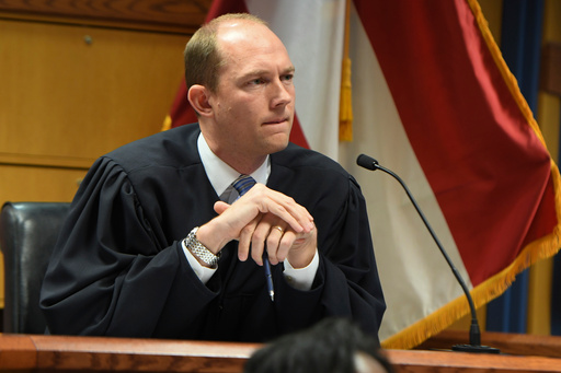 FILE - Judge Scott McAfee addresses the lawyers during a hearing on charges against former President Donald Trump in the Georgia election interference case, Thursday, March 28, 2024 in Atlanta. (Dennis Byron/Hip Hop Enquirer via AP, Pool, File)