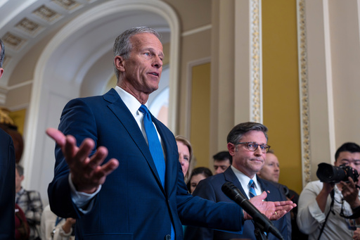 Senate Majority Leader John Thune, R-S.D., is joined by Speaker of the House Mike Johnson, R-La., right, as they speak with reporters following a closed-door Republican strategy session as the government shutdown heads toward a second week, at the Capitol in Washington, Tuesday, Oct. 7, 2025. (AP Photo/J. Scott Applewhite)