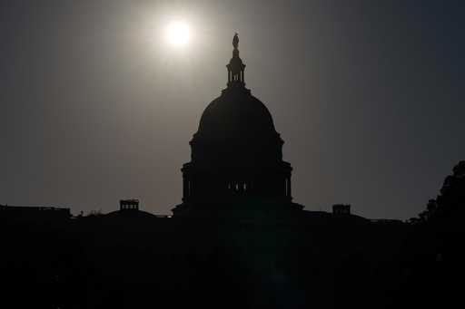 The U.S. Capitol is seen at sunrise on the 6th day of the government shutdown, at the Capitol in Washington, Monday, Oct. 6, 2025. (AP Photo/Jose Luis Magana)