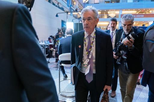 Federal Reserve Board Chairman Jerome Powell walks to a meeting during the World Bank/IMF Annual Meetings at the International Monetary Fund (IMF) headquarters in Washington, Thursday, Oct. 16, 2025. (AP Photo/Jose Luis Magana)