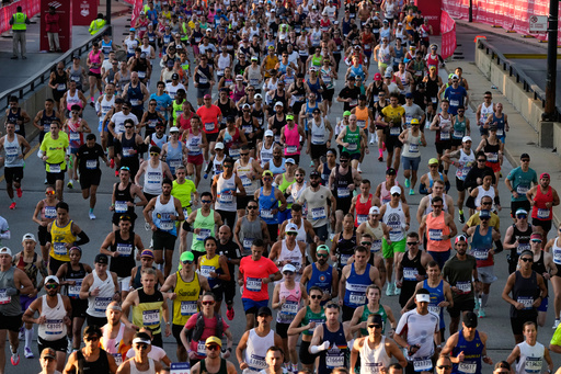 Runners participate in the Chicago Marathon, Sunday, Oct. 12, 2025. (AP Photo/Nam Y. Huh)