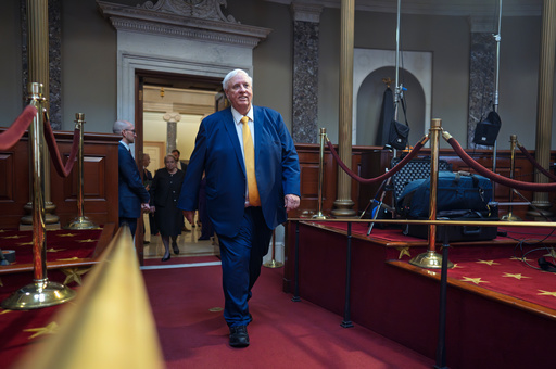 FILE Sen. Jim Justice, R-W.Va., arrives in the Old Senate Chamber for a mock swearing-in ceremony, at the Capitol, in Washington, Tuesday, Jan. 14, 2025. (AP Photo/J. Scott Applewhite)