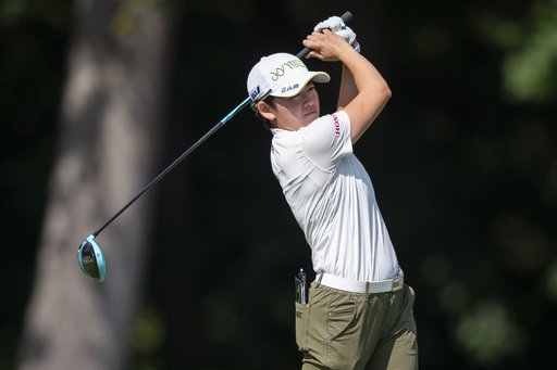 Akie Iwai, of Japan, tees off on the ninth hole during the first round of the Kroger Queen City Championship golf tournament, Thursday, Sept. 11, 2025, at TPC River's Bend in Cincinnati. (AP Photo/Tanner Pearson)