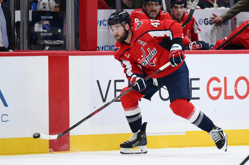 Washington Capitals right wing Tom Wilson (43) skates with the puck during the first period of an NHL hockey game against the Tampa Bay Lightning, Tuesday, Oct. 14, 2025, in Washington. (AP Photo/Nick Wass)