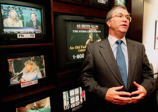 FILE - CNN CEO Tom Johnson talks about the network's retracted story about U.S. military use of nerve gas against Vietnam War defectors in his office at CNN's headquarters in Atlanta on July 6, 1998. Johnson said, "I regret that I let Ted (Turner) down. This is Ted's creation and I know he is disappointed." (AP Photo/Ric Feld, File)