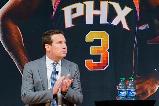 FILE - Phoenix Suns owner Mat Ishbia looks on during an NBA basketball news conference, Feb. 16, 2023, in Phoenix. (AP Photo/Matt York, File)