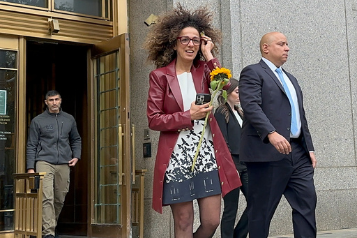 Iranian American journalist Masih Alinejad walks out of Manhattan federal court, Wednesday, Oct. 29, 2025, in New York, after two Russian mobsters were sentenced to 25 years in prison for agreeing to attempt to assassinate her. (AP Photo/Larry Neumeister)