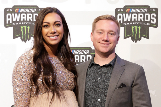 FILE - Tyler Reddick, right, and Alexa DeLeon arrive for the NASCAR Cup Series Awards Dec. 5, 2019, in Nashville, Tenn. (AP Photo/Mark Humphrey, File)