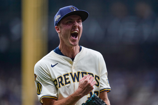 Milwaukee Brewers relief pitcher Jacob Misiorowski (32) celebrates after forcing the final out during the top of the third inning of Game 2 of baseball's National League Division Series against the Chicago Cubs Monday, Oct. 6, 2025, in Milwaukee. (AP Photo/Kayla Wolf)