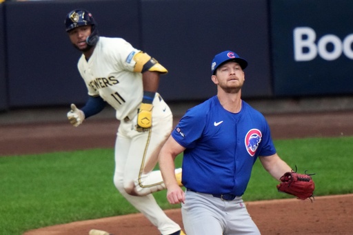 Chicago Cubs pitcher Matthew Boyd watches as Milwaukee Brewers' Jackson Chourio hits a two-run scoring single during the first inning of Game 1 of baseball's National League Division Series Saturday, Oct. 4, 2025, in Milwaukee. (AP Photo/Morry Gash)