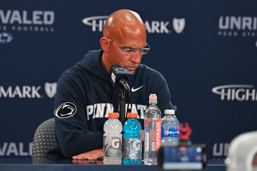Penn State head coach James Franklin reacts during a press conference following an NCAA college football game against Northwestern, Saturday, Oct. 11, 2025, in State College, Pa. (AP Photo/Barry Reeger)