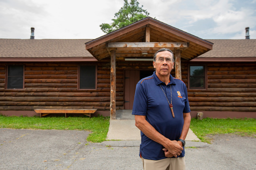 FILE - Tadodaho Sid Hill, takes a break from meetings to pose for a portrait outside of the Onondaga Nation's longhouse, Thursday, Aug. 3, 2023, on the Onondaga Nation territory in central New York. (AP Photo/Lauren Petracca, File)