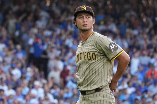 San Diego Padres' Yu Darvish leaves the game during the second inning of Game 3 of a National League wild card baseball game against the Chicago Cubs Thursday, Oct. 2, 2025, in Chicago. (AP Photo/Nam Huh)