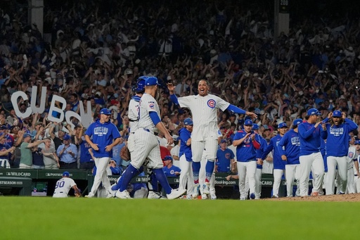 The Chicago Cubs celebrate after Game 3 of a National League wild card baseball game against the San Diego Padres Thursday, Oct. 2, 2025, in Chicago. (AP Photo/Nam Huh)