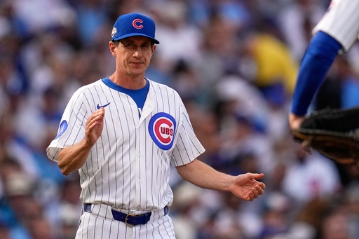 Chicago Cubs' Craig Counsell makes a pitching change during the sixth inning of Game 2 of a National League wild card baseball game against the San Diego Padres Wednesday, Oct. 1, 2025, in Chicago. (AP Photo/Erin Hooley)