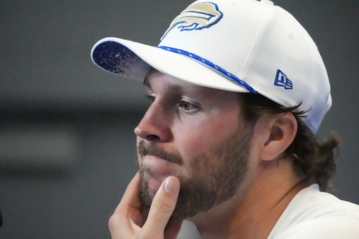 Buffalo Bills quarterback Josh Allen talks to the media following an NFL football game against the New England Patriots, Sunday, Sept. 5, 2025, in Orchard Park, N.Y. (AP Photo/Gene J. Puskar)
