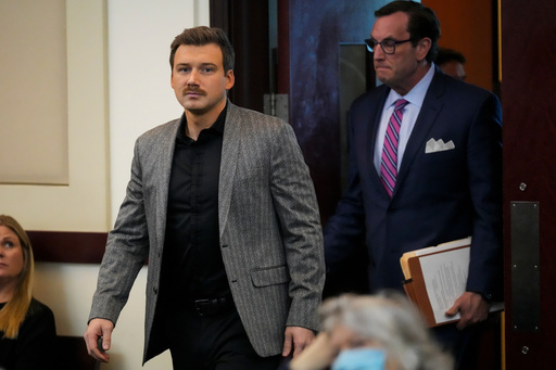 FILE - Morgan Wallen, left, appears in court to plead guilty to reckless endangerment charges related to throwing a chair off a six-story balcony Thursday, Dec. 12, 2024, in Nashville, Tenn. (AP Photo/George Walker IV, File)