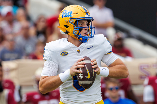 Pittsburgh quarterback Mason Heintschel (6) looks for a receiver during the first half of an NCAA college football game against Florida State, Saturday, Oct. 11, 2025, in Tallahassee, Fla. (AP Photo/Colin Hackley)