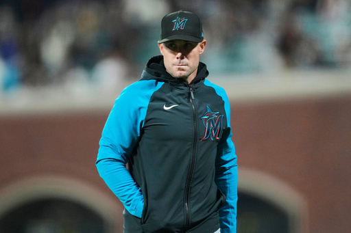 FILE - Miami Marlins manager Skip Schumaker walks off the field during the third inning of a baseball game against the San Francisco Giants= in San Francisco, Friday, Aug. 30, 2024. (AP Photo/Jeff Chiu, File)
