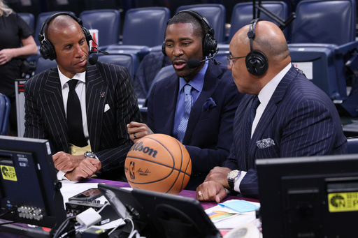 NBC Sports broadcasters, from left, Reggie Miller, Jamal Crawford and Mike Tirico talk after an NBA basketball game between the Houston Rockets and Oklahoma City Thunder, Tuesday, Oct. 21, 2025, in Oklahoma City. (AP Photo/Nate Billings)