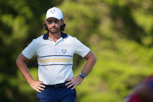 Europe's Tommy Fleetwood waits to play on the 13th hole during their singles match on the Bethpage Black golf course at the Ryder Cup golf tournament, Sunday, Sept. 28, 2025, in Farmingdale, N.Y. (AP Photo/Lindsey Wasson)
