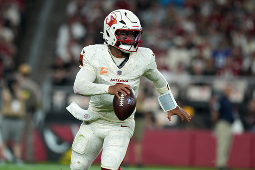 Arizona Cardinals quarterback Kyler Murray (1) scrambles during the first half of an NFL football game against the Seattle Seahawks Thursday, Sept. 25, 2025, in Glendale, Ariz. (AP Photo/Rick Scuteri)