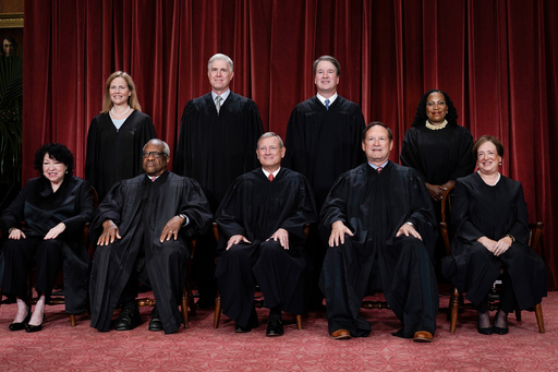 FILE - Members of the Supreme Court sit for a new group portrait at the Supreme Court building in Washington, Oct. 7, 2022. (AP Photo/J. Scott Applewhite, File)