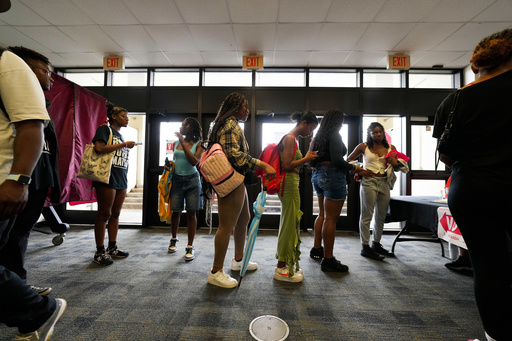 FILE - Students line up to vote at a campus polling place at Southern University in Baton Rouge, La., on Election Day, Nov. 5, 2024. (AP Photo/Gerald Herbert, File)