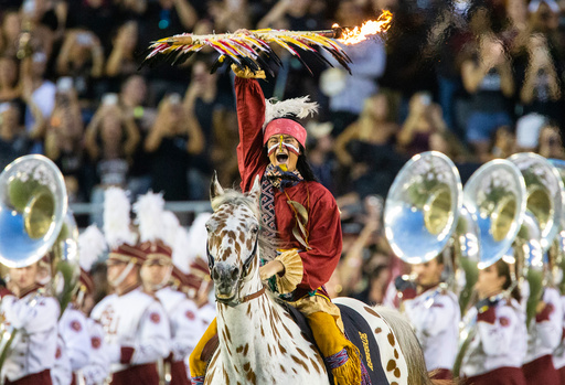 FILE - Florida State mascot Osceola, aboard Renegade, rides across the field before an NCAA college football game against Virginia Tech in Tallahassee, Fla., Monday, Sept. 3, 2018. (AP Photo/Mark Wallheiser, File)