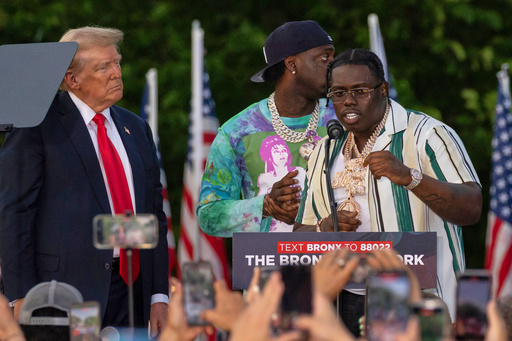 FILE - Rapper Sheff G, also known as Michael Williams, right, joins then Republican presidential candidate Donald Trump during a campaign rally in the Bronx borough of New York on May. 23, 2024. (AP Photo/Yuki Iwamura, File)