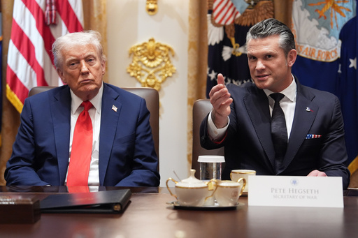 Defense Secretary Pete Hegseth speaks as President Donald Trump holds a cabinet meeting at the White House, Thursday, Oct. 9, 2025, in Washington. (AP Photo/Evan Vucci)