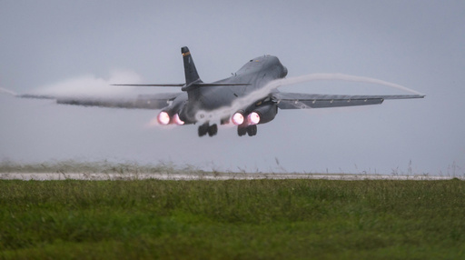 FILE - In this photo released by the U.S. Air Force, a Air Force B-1B Lancer bomber takes off from Andersen Air Force Base, Guam, to fly a mission with two Koku Jieitai (Japan Air Self-Defense Force) F-15s, Sept. 9, 2017. (Senior Airman Jacob Skovo/U.S. Air Force via AP)