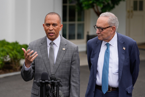 House Minority Leader Hakeem Jeffries, D-N.Y., and Senate Minority Leader Chuck Schumer of N.Y., talk to reporters outside the West Wing of the White House, Monday, Sept. 29, 2025, in Washington. (AP Photo/Alex Brandon)