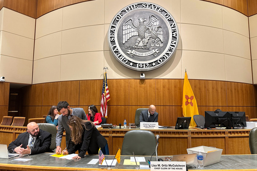 Democratic state House Speaker Javier Martínez, center back, of Albuquerque, N.M., takes his seat at the opening of a special legislative session about proposals to shore up safety net spending in response to President Donald Trump's recent cuts, Wednesday, Oct. 1, 2025. (AP Photo/Morgan Lee)